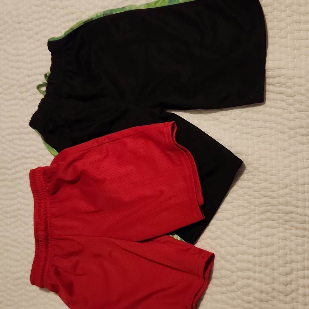 Little boys size m shorts. 1 is red and the other is black with mindcraft green